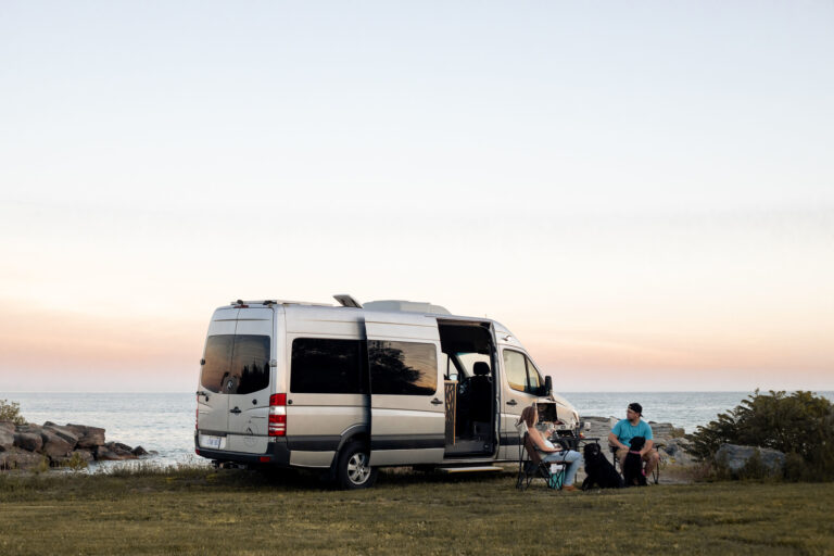 Camper Van Beach with Lawn Chairs