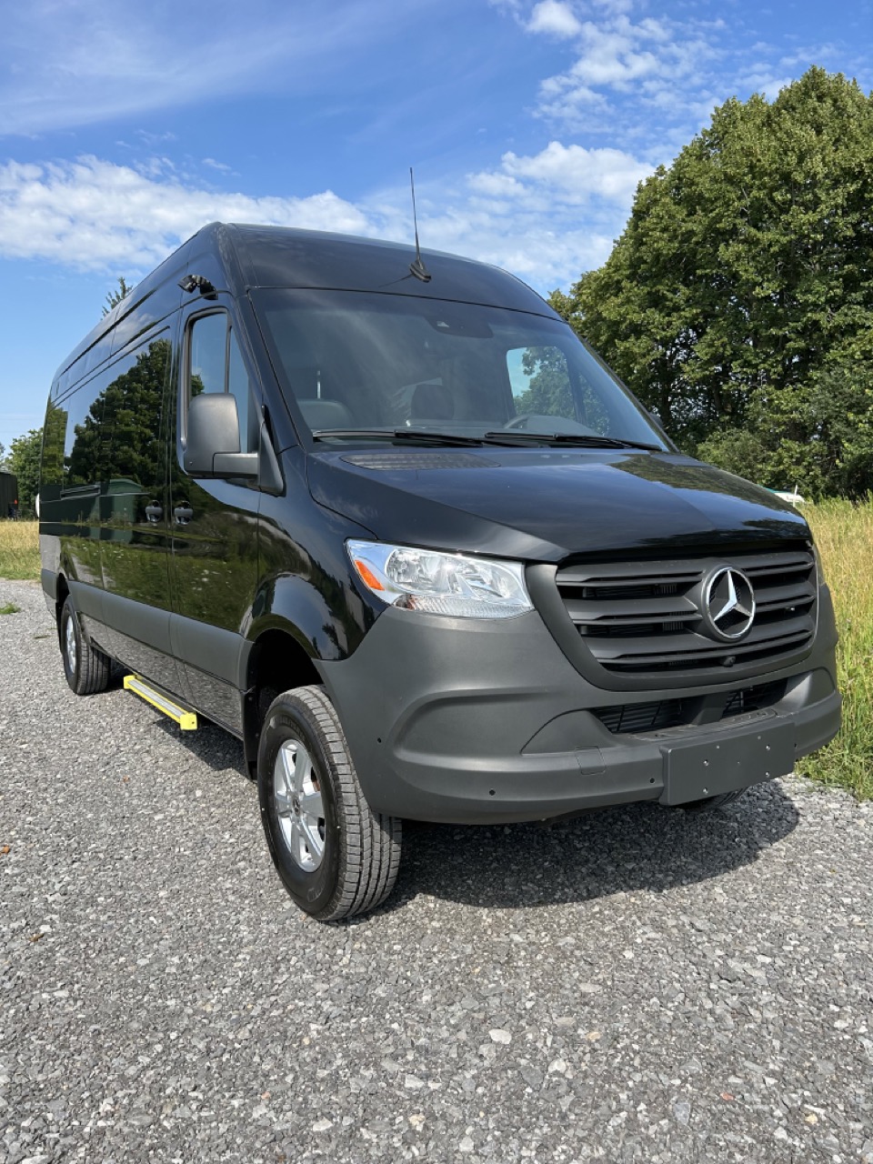Black Camper Van Front View Sunny