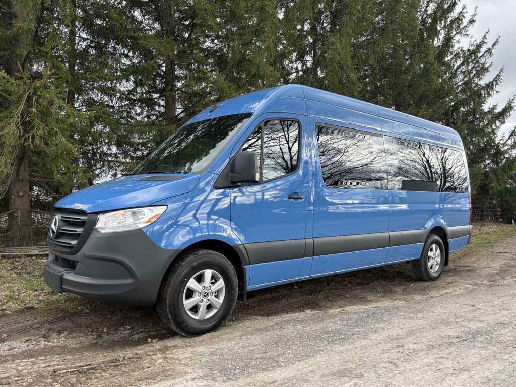 Blue Camper Van Front Driverside